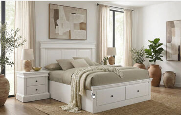 Dove white bedside table with black knob handles and smooth-